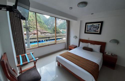 Aguas Calientes Hotel | Flower's House MachuPicchu