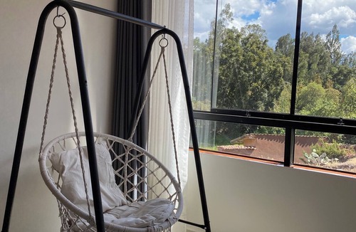 Urubamba Apartment | FULL-SIZE SUNROOM WITH PANORAMIC VIEWS AND A BATHTUB