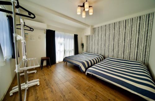 Nishi Ward Apartment | Guest House Re-worth Joshin1 4F