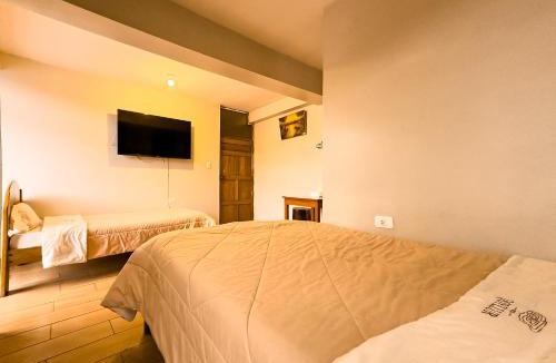 Urcos Hotel | Hotel Qoyllur urcos