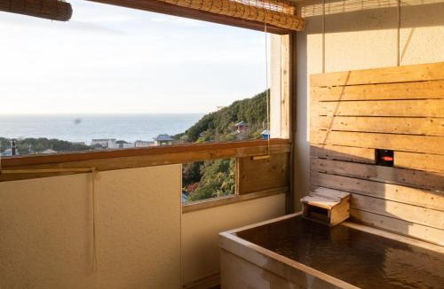 Tsubaki Onsen Hotel | Hotel Tenzankaku Kaiyutei