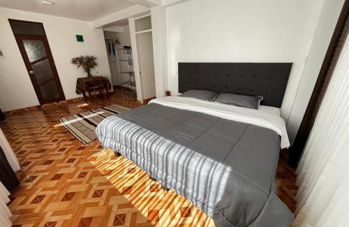 Calca Apartment | In Bed sheets