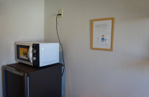Ikuno Apartment | It has a kitchen, closet, shoe closet, washing machine, balcony and parking space. Clothes can be dried on the balcony, or room-dried. The 46 sq. m. of space is ideal for long-term stays.