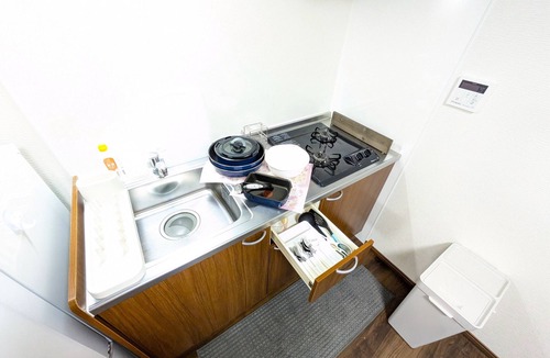 Nishinari Apartment | Available for 1 to a maximum of 7 persons. Free wifi. It is a quiet place in spite of its central location.