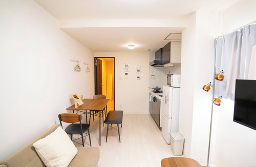 Shinsekai Apartment | Just outside of Namba! Tsutenkaku Tower can be seen from the corridor.