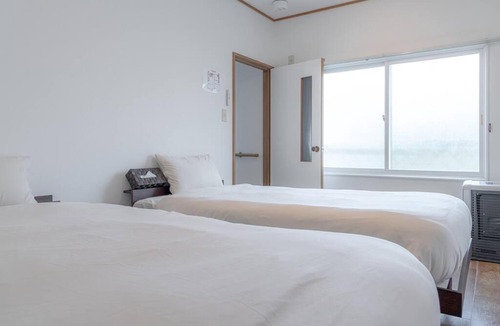 Motomachi Apartment | KAKUREGA by unito