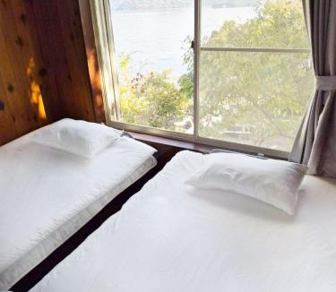 Hinasecho Hinase Villa | Large Beachfront Island Villa Sleeps 12 Ideal for Groups