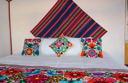 Puno Hotel | Little house on the floating islands of the Uros, Lake Titicaca, Puno-Peru