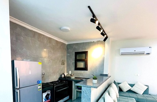 Al-Manasrah Ski Chalet | Luxurious Chalet with Ocean Views in Port Said Resort
