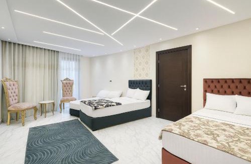 Al-Manasrah Ski Chalet | Luxurious Chalet with Ocean Views in Porto Said Resort