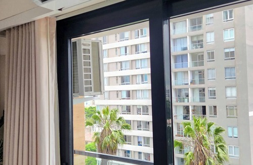 Barranco Apartment | Luxury apartment with a pool, ocean view, air conditioning, and a digital fireplace