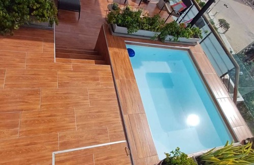Ica Apartment | Luxury Apt w/Rooftop Pool & City Views, Ica