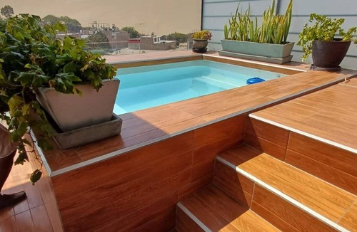 Ica Apartment | Luxury Apt w/Rooftop Pool & City Views, Ica