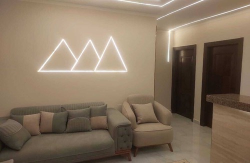 Kafrat al Jabal Apartment | Marvelous 4-bedroom apartment with AC near the pyramids in Giza