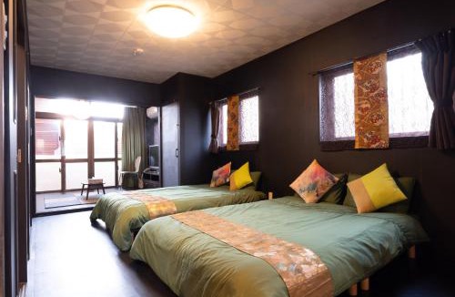 Maejima House | Maximum of 18 people can be rented in one building 3 minutes walk to Tomari Port 10 minutes drive to the airport No parking lot 30 seconds walk from paid parking lot warayunso port city May