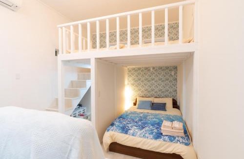 Maejima House | Maximum of 18 people can be rented in one building 3 minutes walk to Tomari Port 10 minutes drive to the airport No parking lot 30 seconds walk from paid parking lot warayunso port city May