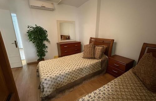 Dream Land Apartment | Modern 2-Bedroom Apartment with Private Building Pool