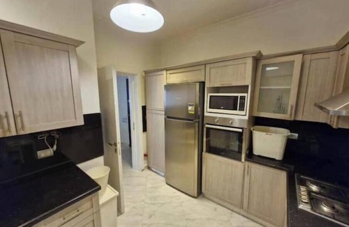 The 5th Settlement Apartment | Modern 3BR Apartment in The Village Compound | Near AUC | WiFi & Terrace
