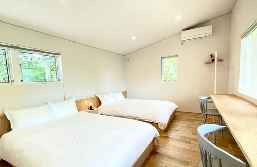 Kitasaku-gun House | New villa Open space with vaulted ceilingLuxury / Kitasaku-gun Nagano