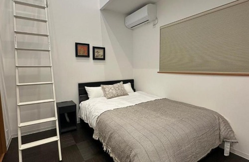 Nishi Villa | Nikyo Shine Inn Two parking spaces 4 bedrooms 7 minutes to Kujo Station 4 rooms, 2 bathrooms, private building