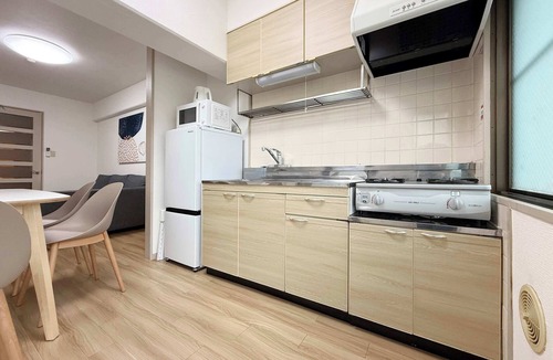 Hiroshima City Centre Apartment | Relaxing 2BR Near City Center Dining & Kitchen
