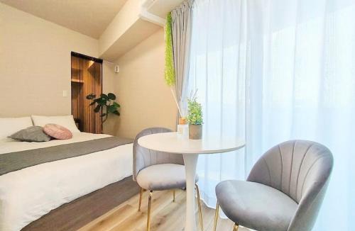 Konohana Apartment | Residential Hotel Alex 501 USJまで5分 なんば,関空直通 西九条駅から徒歩4分の好立地