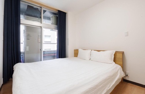 Namba Apartment | Shin no Kyo 608 - 2-Min Walk to Kuromon Market - Family Suite with 2 Bedrooms - 2 Toilets & 1 Bathroom - Heated Living Room Floor - Near Dotonbori
