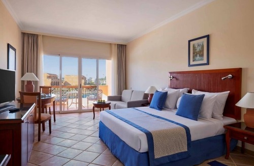 Port Ghalib Hotel | Steps from Coraya Bay & Dive Sites l Four Rooms, Pools, Spa, Tennis & Kids Club