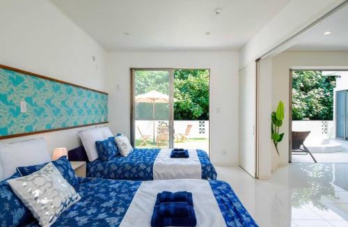 Nakijin Villa | The KOURI 海まで30秒の絶景ヴィラ 星空ジャグジーとBBQ 最大10名 ペット可