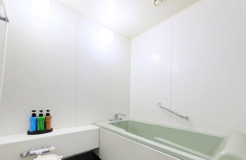 Kominato Onsen House | Twin 69 square meters All rooms have an ocean vi / Kamogawa Chiba
