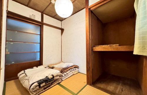 Kita Ward House | ura Yadokari House