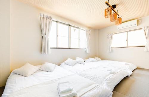 Minato Villa | USJまで車で15分 戸建て貸切 寝室2部屋 ベッド6台 最大12名利用a