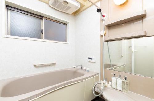 Minato Villa | USJまで車で15分 戸建て貸切 寝室2部屋 ベッド6台 最大12名利用a