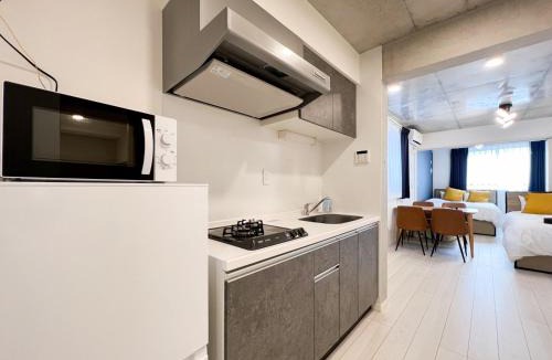 Horinouchi Apartment | Wellsquareism Honancho
