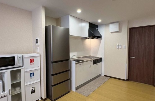 Kamata House | YU'S HOUSE 3, newly renovated and open, is located right next to the East Exit of JR Kamata Station and directly across from the Kamata East Exit terminal bus stop on the route from Haneda Airport.