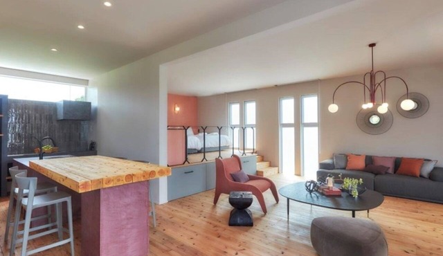 A luxurious inn with a coralcolored interiorEmer / Miyakojima Okinawa