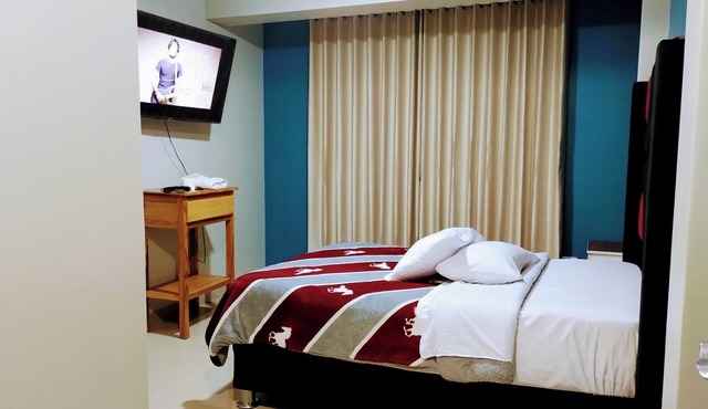 Hostal TOSCANO SUITES in El Tambo
