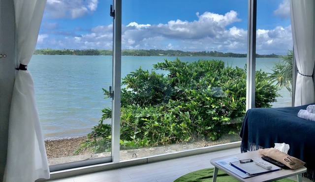 Indigo Ocean front Large windows overlook the se / Nago Okinawa in Nago