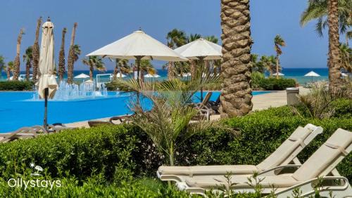 OllyStays - Seaview Mangroovy 1BR, Beach & Pool Free Access
