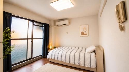 Osaka Umeda West JR Tsukamoto Inn 44 in Osaka