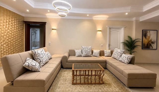 Perfect Family Getaway 3-Bedroom Apartment in Dokki | Comfort & Convenient