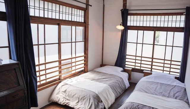 Taketa station hostel cue