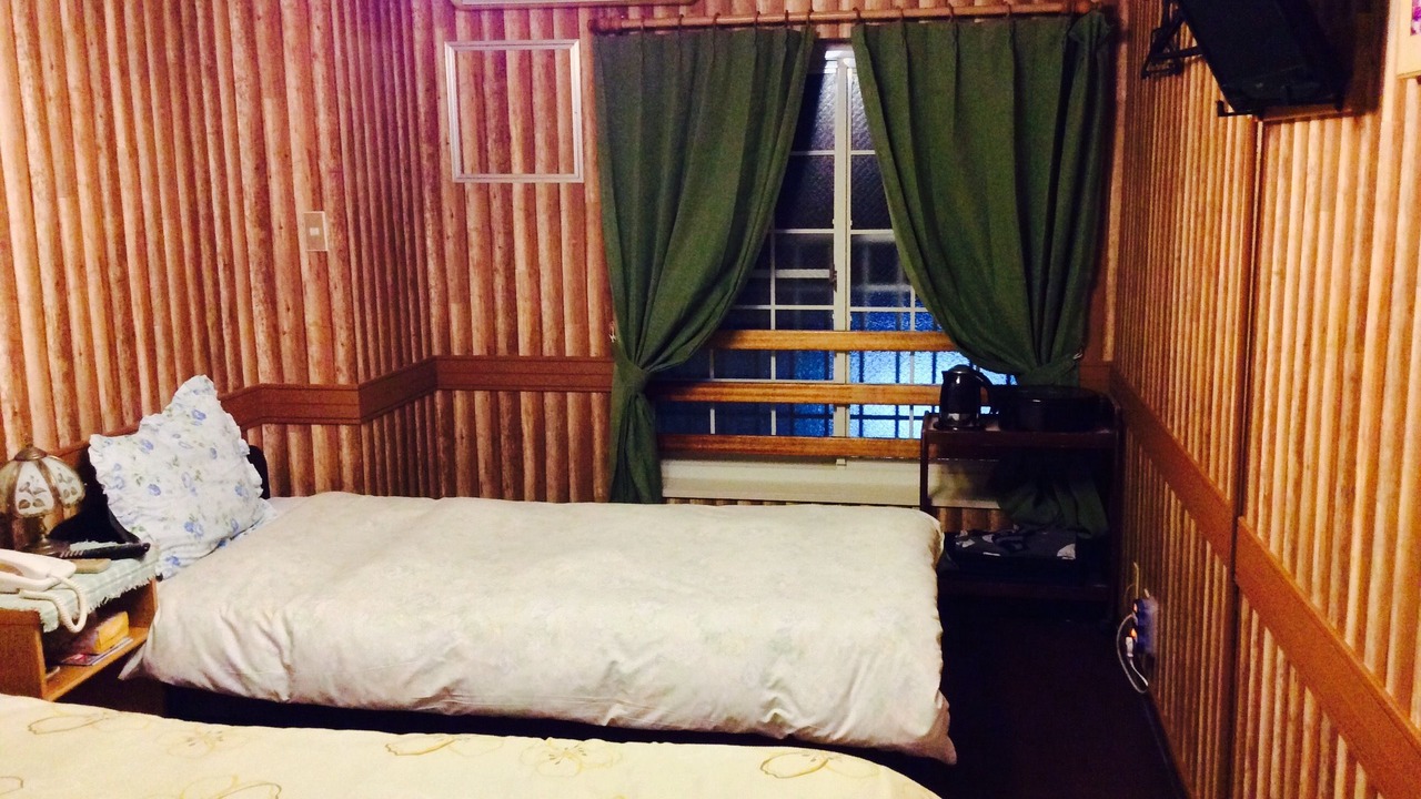 Photo of Bedroom in Dogo Hot Spring