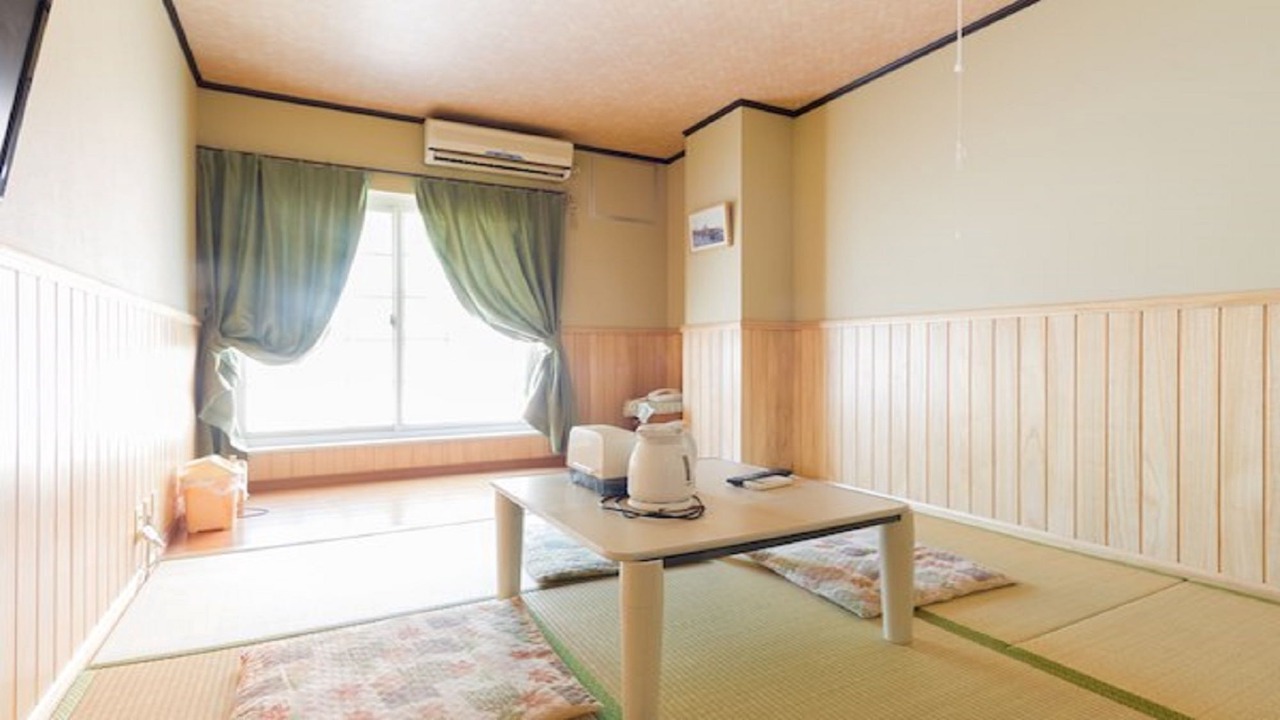 Photo of Bedroom in Dogo Hot Spring