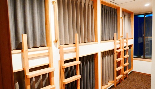 Single-size Cabin Bed Dormitory with Shared Bathroom