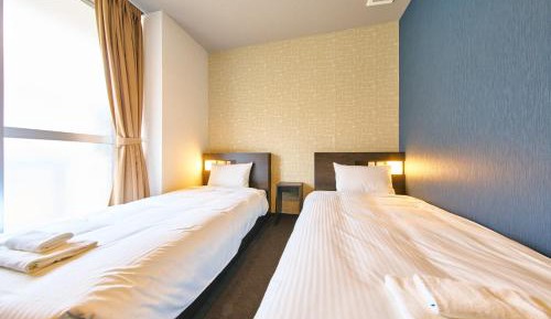 Twin Room with Shared Bathroom