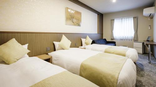 Deluxe Triple Room