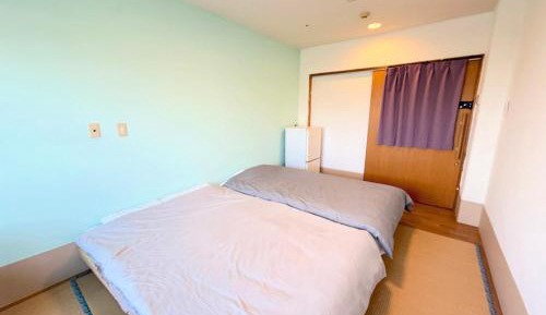 Quadruple Room with Shared Bathroom