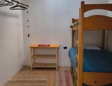 Single Bed in Dormitory Room