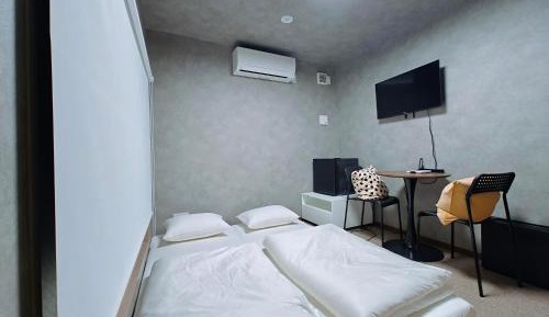 Double or Twin Room with Shared Bathroom
